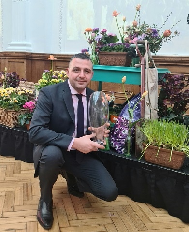 Paul Ellison with his award