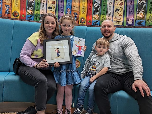 Erin Burgess with mum Laura; dad James; and brother Matthew