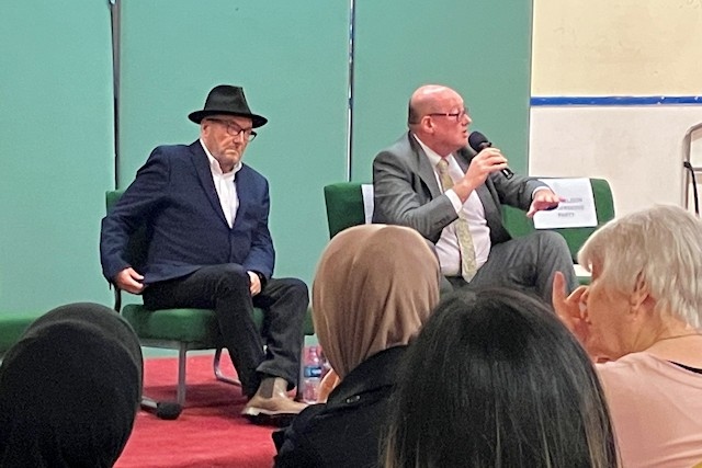 Iain Donaldson (right), the candidate for the Liberal Democrats speaking at the hustings