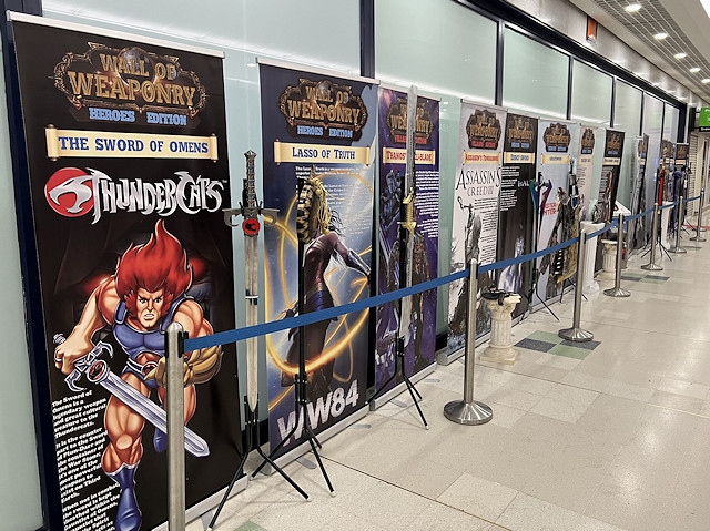 The Wall of Weaponry features villain and hero swords